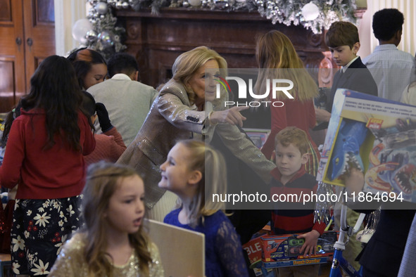 The First Lady Jill Biden holds a U.S. Marine Corps Reserve Toys for Tots event with local Marine Corps families in the East Room of the Whi...