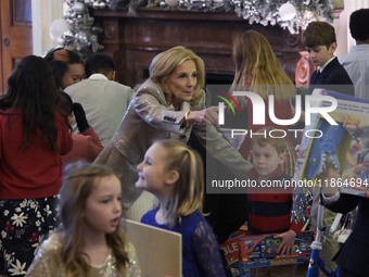 The First Lady Jill Biden holds a U.S. Marine Corps Reserve Toys for Tots event with local Marine Corps families in the East Room of the Whi...