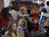 The First Lady Jill Biden holds a U.S. Marine Corps Reserve Toys for Tots event with local Marine Corps families in the East Room of the Whi...