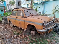 An abandoned iconic yellow Ambassador taxi is seen in Kolkata, India, on December 13, 2024. The Calcutta High Court orders that Kolkata's ic...