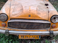 An abandoned iconic yellow Ambassador taxi is seen in Kolkata, India, on December 13, 2024. The Calcutta High Court orders that Kolkata's ic...