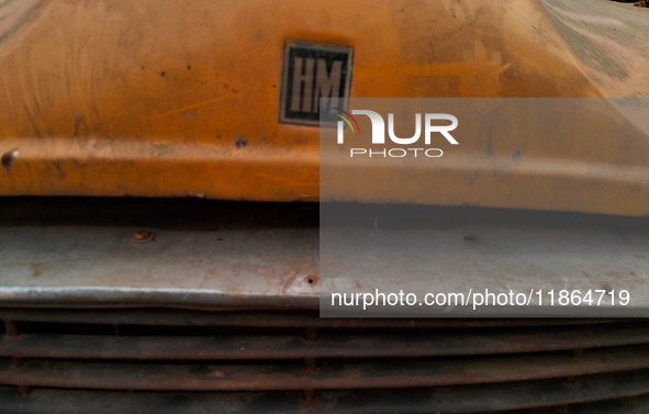 The logo of an abandoned iconic yellow ambassador taxi is seen in Kolkata, India, on December 13, 2024. The Calcutta High Court's order stat...