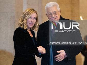 Italian Prime Minister Giorgia Meloni welcomes Palestinian President Mahmud Abbas at Palazzo Chigi prior to their meeting in Rome, Italy, on...