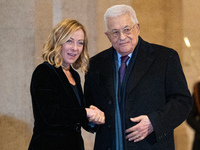 Italian Prime Minister Giorgia Meloni welcomes Palestinian President Mahmud Abbas at Palazzo Chigi prior to their meeting in Rome, Italy, on...