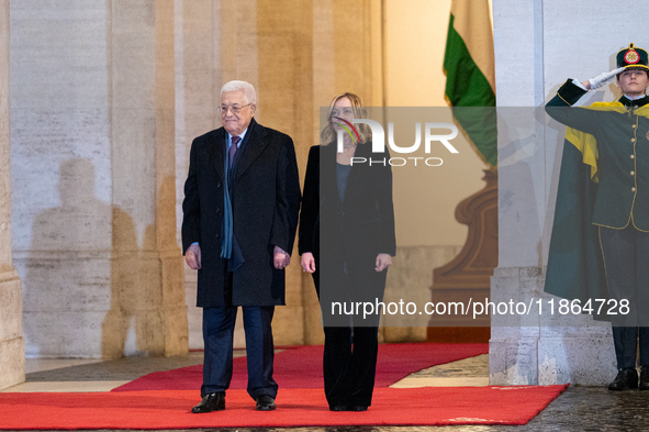 Italian Prime Minister Giorgia Meloni welcomes Palestinian President Mahmud Abbas at Palazzo Chigi prior to their meeting in Rome, Italy, on...