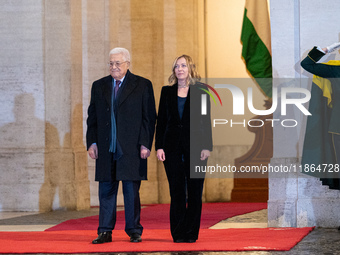 Italian Prime Minister Giorgia Meloni welcomes Palestinian President Mahmud Abbas at Palazzo Chigi prior to their meeting in Rome, Italy, on...