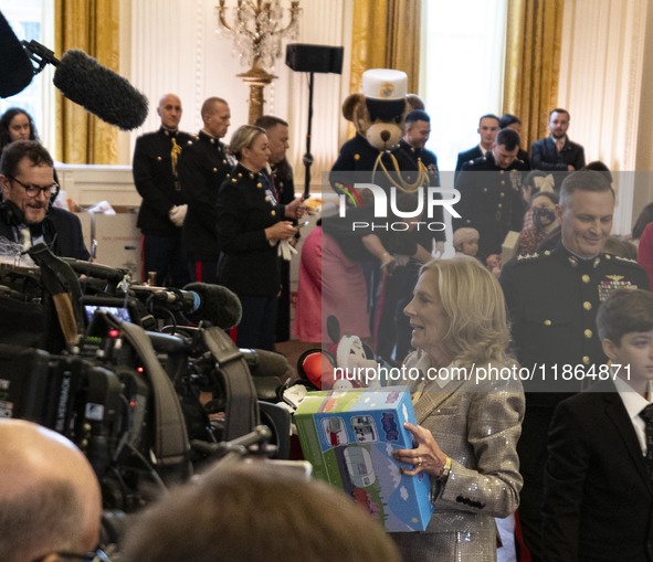 On December 13, 2024, in Washington, D.C., United States, First Lady Jill Biden hosts a U.S. Marine Corps Reserve Toys for Tots event at the...