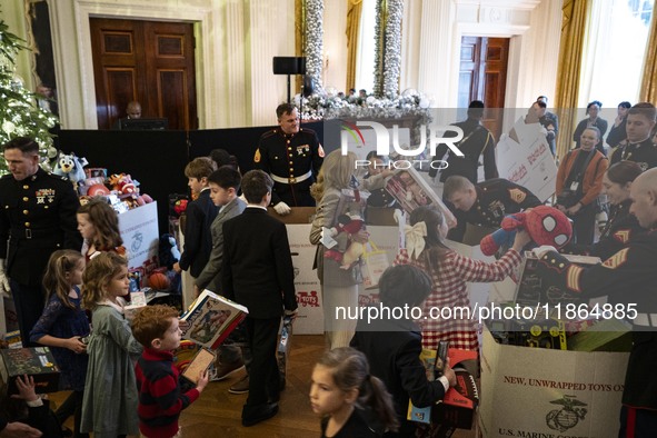 On December 13, 2024, the First Lady, Jill Biden, hosts a U.S. Marine Corps Reserve Toys for Tots event at the White House with local Marine...