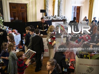 On December 13, 2024, the First Lady, Jill Biden, hosts a U.S. Marine Corps Reserve Toys for Tots event at the White House with local Marine...