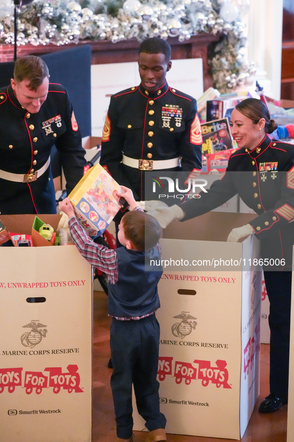 The First Lady hosts a Toys for Tots event at the White House with military families in Washington, D.C, on december 13, 2024. 