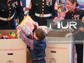 The First Lady hosts a Toys for Tots event at the White House with military families in Washington, D.C, on december 13, 2024. (