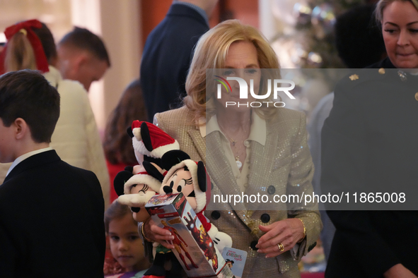 The First Lady hosts a Toys for Tots event at the White House with military families in Washington, D.C, on december 13, 2024. 