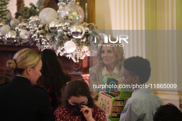 The First Lady hosts a Toys for Tots event at the White House with military families in Washington, D.C, on december 13, 2024. 