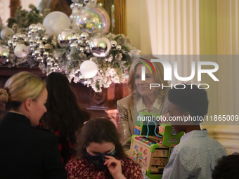 The First Lady hosts a Toys for Tots event at the White House with military families in Washington, D.C, on december 13, 2024. (