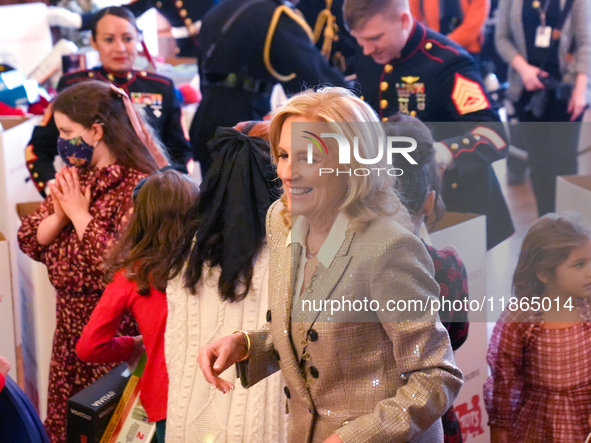 The First Lady hosts a Toys for Tots event at the White House with military families in Washington, D.C, on december 13, 2024. 