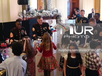 The First Lady hosts a Toys for Tots event at the White House with military families in Washington, D.C, on december 13, 2024. (