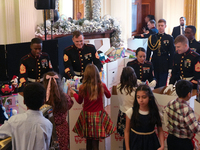 The First Lady hosts a Toys for Tots event at the White House with military families in Washington, D.C, on december 13, 2024. (