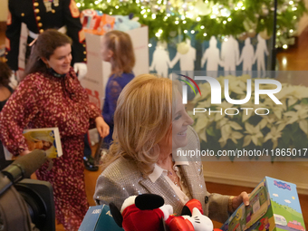 The First Lady hosts a Toys for Tots event at the White House with military families in Washington, D.C, on december 13, 2024. (