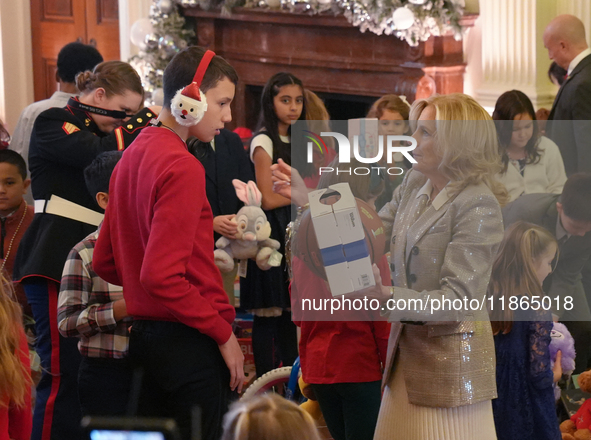 The First Lady hosts a Toys for Tots event at the White House with military families in Washington, D.C, on december 13, 2024. 