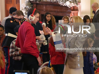 The First Lady hosts a Toys for Tots event at the White House with military families in Washington, D.C, on december 13, 2024. (