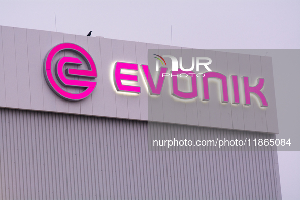 A general view of the logo of the Evonik Chemical plant in Wesseling near Cologne, Germany, on December 13, 2024, as Evonik plans to cut 7,0...