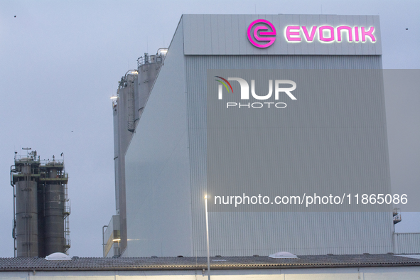 A general view of the logo of the Evonik Chemical plant in Wesseling near Cologne, Germany, on December 13, 2024, as Evonik plans to cut 7,0...