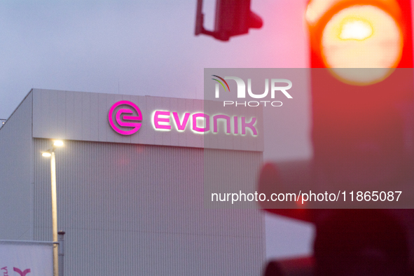 A general view of the logo of the Evonik Chemical plant in Wesseling near Cologne, Germany, on December 13, 2024, as Evonik plans to cut 7,0...