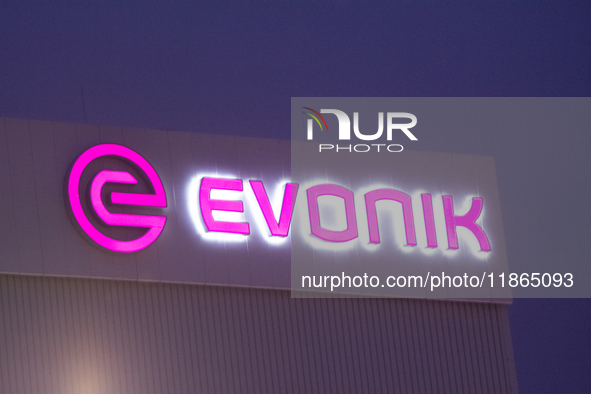 A general view of the logo of the Evonik Chemical plant in Wesseling near Cologne, Germany, on December 13, 2024, as Evonik plans to cut 7,0...