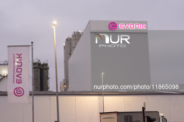 A general view of the logo of the Evonik Chemical plant in Wesseling near Cologne, Germany, on December 13, 2024, as Evonik plans to cut 7,0...