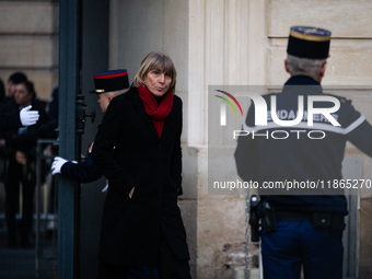 Valerie Letard, the resigned Minister for Housing and Urban Renewal, arrives at the handover ceremony between Michel Barnier, the outgoing P...