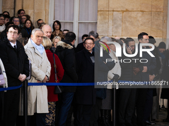 In Paris, France, on December 13, 2024, ministers of the resigning government are seen during the handover ceremony between Michel Barnier,...