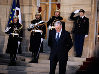 Michel Barnier, the resigning Prime Minister, is seen at the Matignon entrance during the handover ceremony between Michel Barnier, the outg...