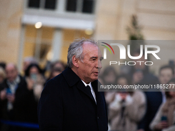 Francois Bayrou, the new Prime Minister, arrives at the handover ceremony between Michel Barnier, the outgoing Prime Minister, and Francois...