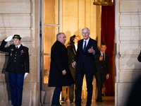 In Paris, France, on December 13, 2024, Michel Barnier, the resigning prime minister, receives Francois Bayrou at the Matignon entrance duri...