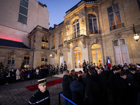 View of the Matignon entrance during the handover ceremony between Michel Barnier, the outgoing Prime Minister, and Francois Bayrou, the new...