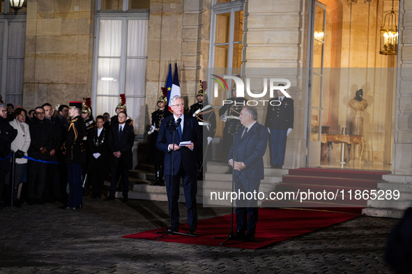 Michel Barnier, the resigning prime minister, and Francois Bayrou, are seen during the speech of the handover ceremony between Michel Barnie...