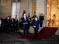 Michel Barnier, the resigning prime minister, and Francois Bayrou, are seen during the speech of the handover ceremony between Michel Barnie...