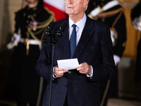 In Paris, France, on December 13, 2024, Michel Barnier, the resigning Prime Minister, speaks during the handover ceremony between himself, t...