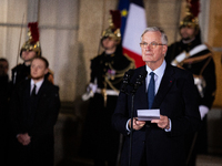 In Paris, France, on December 13, 2024, Michel Barnier, the resigning Prime Minister, speaks during the handover ceremony between himself, t...