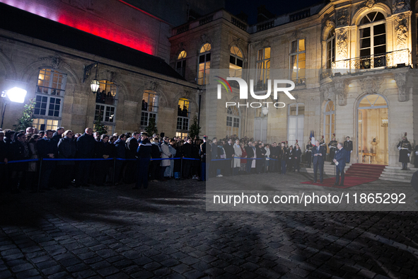 Michel Barnier, the resigning prime minister, and Francois Bayrou are seen during the speech of the handover ceremony between Michel Barnier...