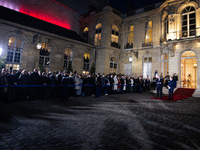 Michel Barnier, the resigning prime minister, and Francois Bayrou are seen during the speech of the handover ceremony between Michel Barnier...