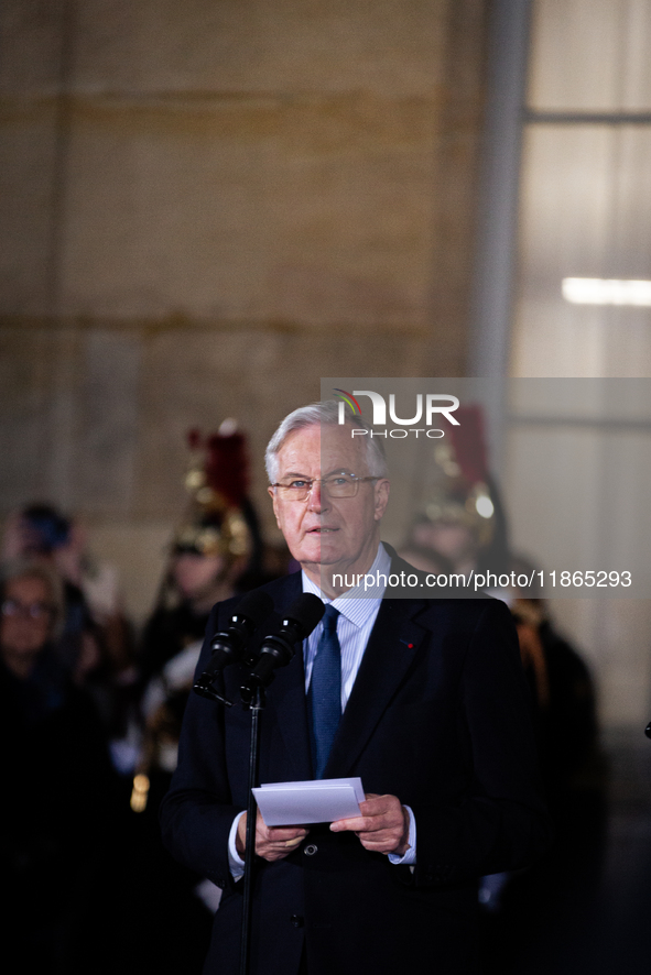 In Paris, France, on December 13, 2024, Michel Barnier, the resigning Prime Minister, speaks during the handover ceremony between himself, t...