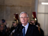 In Paris, France, on December 13, 2024, Michel Barnier, the resigning Prime Minister, speaks during the handover ceremony between himself, t...