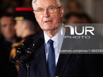 In Paris, France, on December 13, 2024, Michel Barnier, the resigning Prime Minister, speaks during the handover ceremony between himself, t...