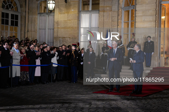 Michel Barnier, the resigning prime minister, and Francois Bayrou, are seen during the speech of the handover ceremony between Michel Barnie...