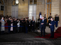 Michel Barnier, the resigning prime minister, and Francois Bayrou, are seen during the speech of the handover ceremony between Michel Barnie...