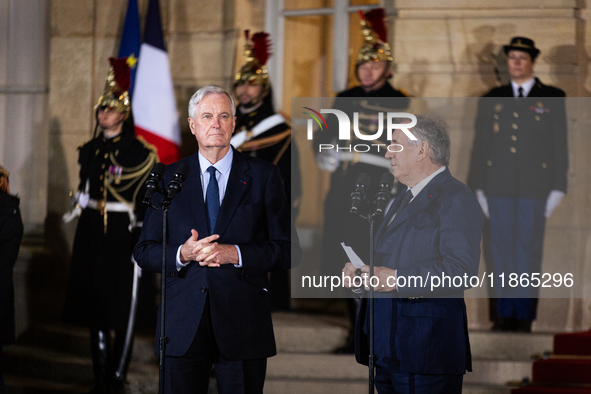 Michel Barnier, the resigning prime minister, and Francois Bayrou, are seen during the speech of the handover ceremony between Michel Barnie...