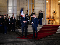 Michel Barnier, the resigning prime minister, and Francois Bayrou, are seen during the speech of the handover ceremony between Michel Barnie...