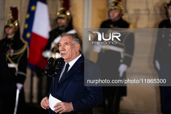 Francois Bayrou speaks during the handover ceremony between Michel Barnier, the outgoing Prime Minister, and Francois Bayrou, the new French...