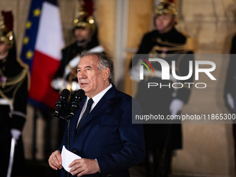 Francois Bayrou speaks during the handover ceremony between Michel Barnier, the outgoing Prime Minister, and Francois Bayrou, the new French...